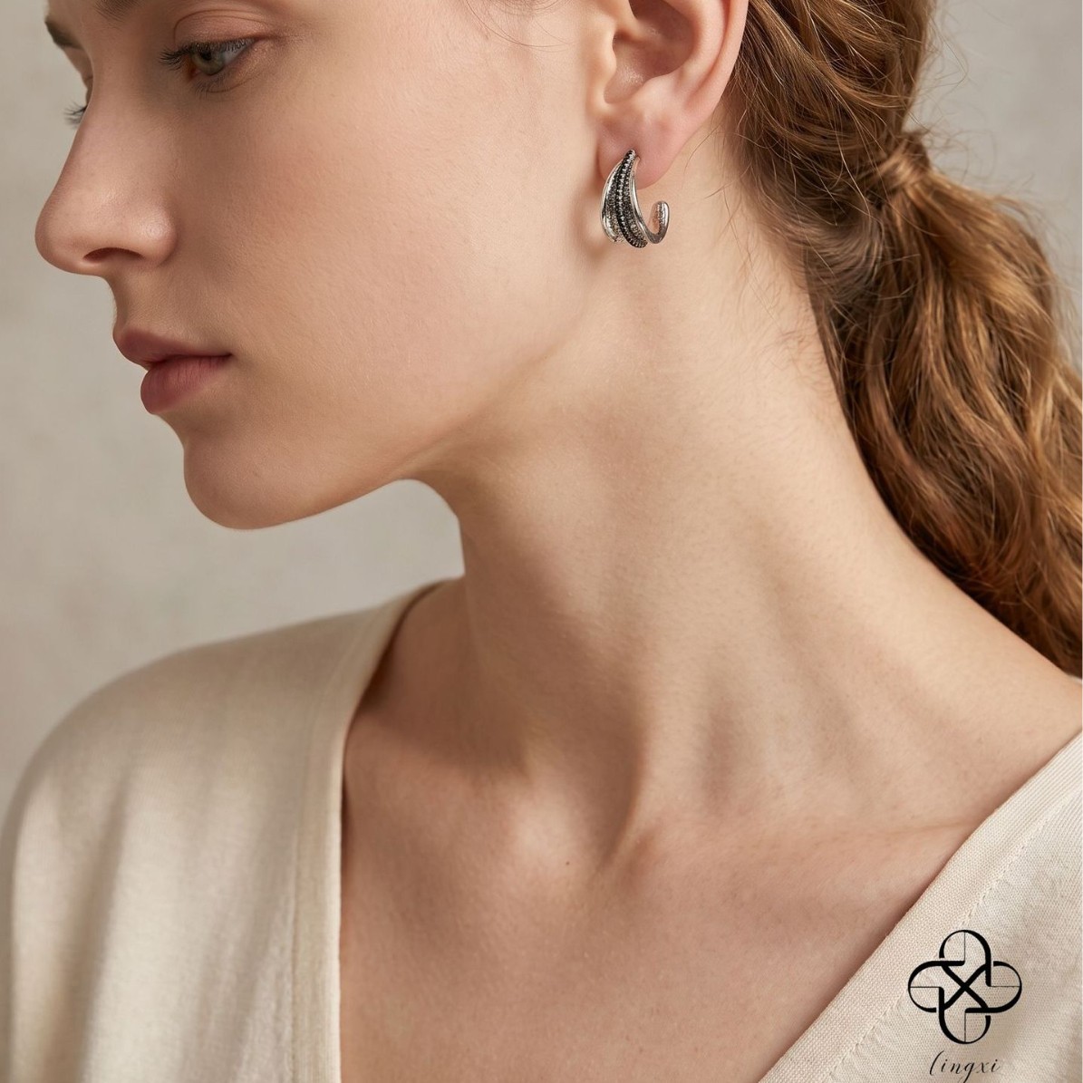 High-end multi-layer black diamond earrings, niche design, three-dimensional cone shape, suitable for commuting, light luxury, versatile metal copper earrings wholesale