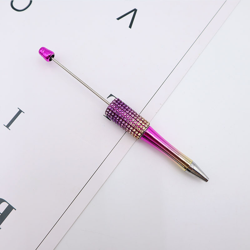 Bolígrafo giratorio de grano lindo de color degradado de tendencia de alto valor Bolígrafo de gomas galvanizado con cuentas de diamantes de bricolaje creativo