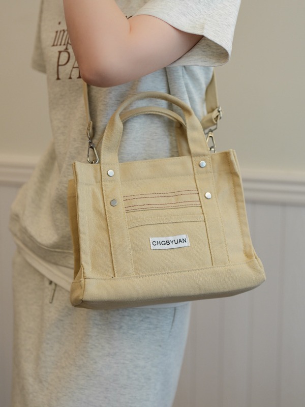 Transfronterizos directos de venta caliente de Amazon tela bolsa de mano para mujeres 2024 nuevo estilo de alta sensación de hombro mochila