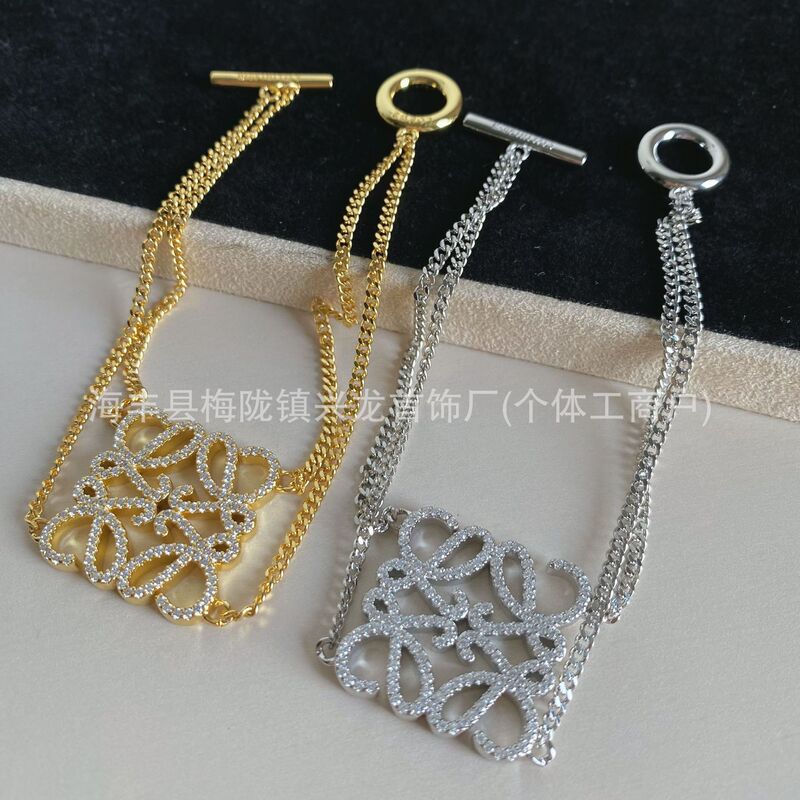 High-quality, authentic photos of the Luowei brand's Chinese knot bracelet with diamond embellishments, a double-layer design, and a square, hollowed-out pattern, available for wholesale High-quality, authentic photos of the Luowei brand's Chinese knot bracelet with diamond embellishments, a double-layer design, and a square, hollowed-out pattern, available for wholesale