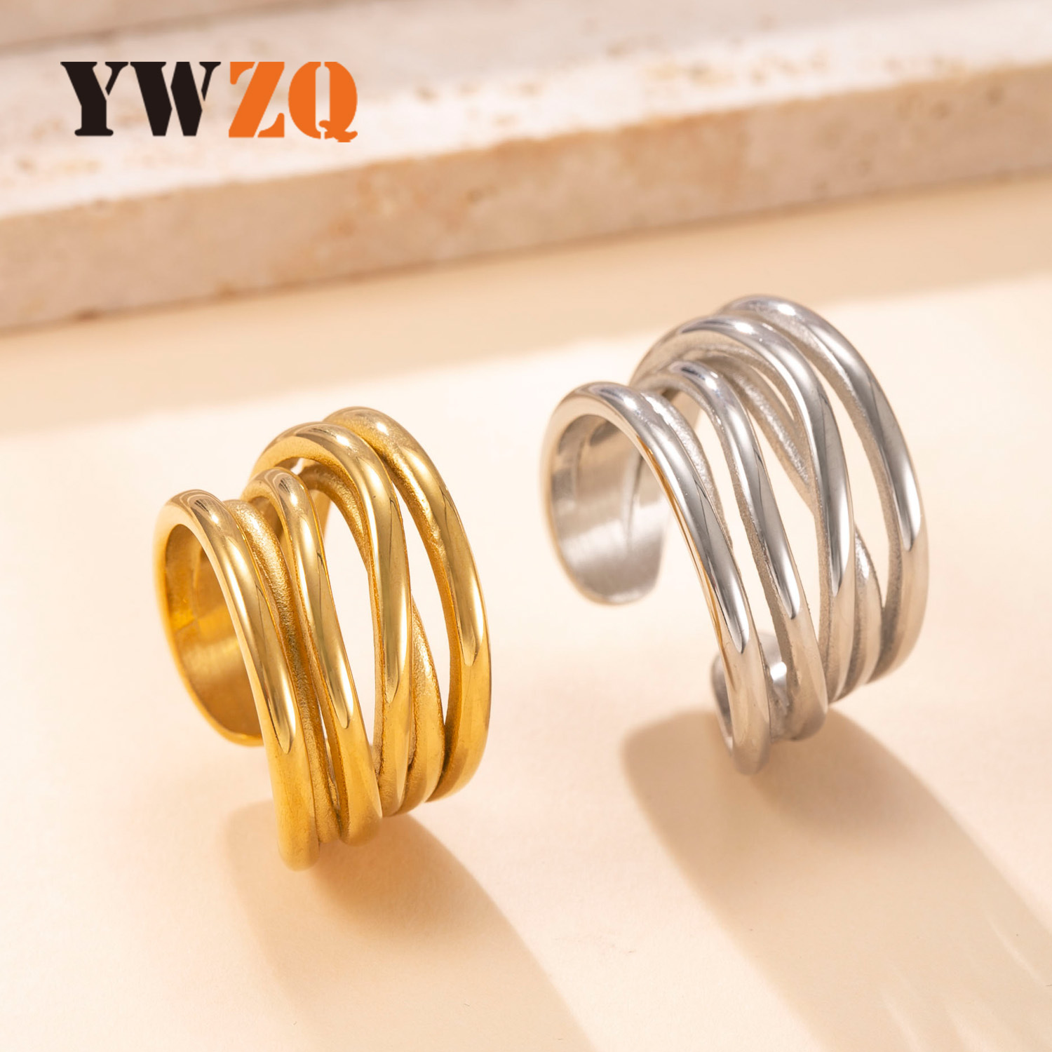 Anillo de acero inoxidable de moda europea y americana fundido anillo de apertura de línea irregular 18k chapado en oro viento frío joyería de acero de titanio