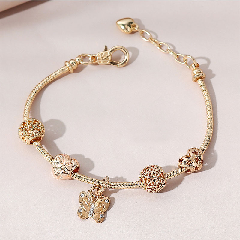 Panjia pulsera Dora DIY cuentas transfronterizas explosión ajustable aleación de mariposa en forma de corazón colgante de diamante pulsera de cobre