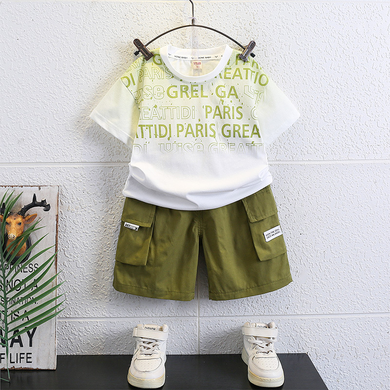 7147 Traje de verano para niños Traje de dos piezas de verano para niños de manga corta casual de Internet rojo bebé de moda de moda nueva 2025