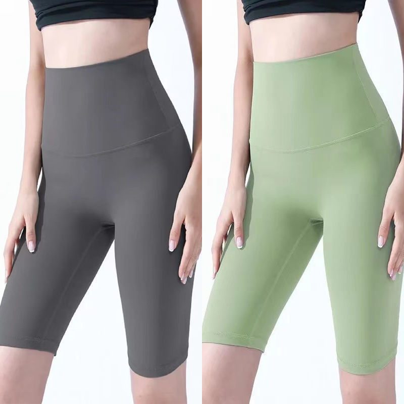 Pantalones cortos desnudos de mujer elásticos apretados para elevar las caderas de cinco puntos pantalones deportivos de secado rápido succión de sudor entrenamiento para correr fábrica de comercio de ping
