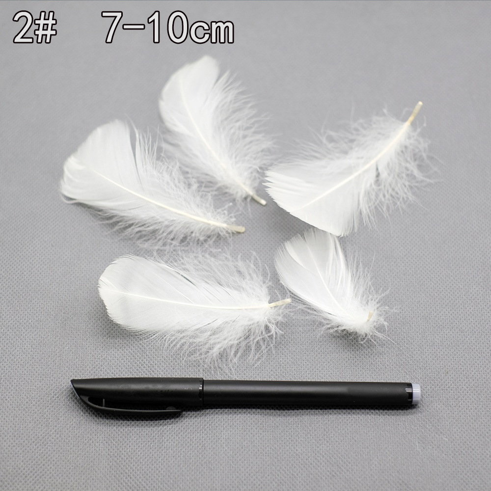Colección de productos de plumas blancas al por mayor Accesorios de ropa de plumas hechos a mano de bricolaje Accesorios de plumas de ganso Material de plumas de pavo