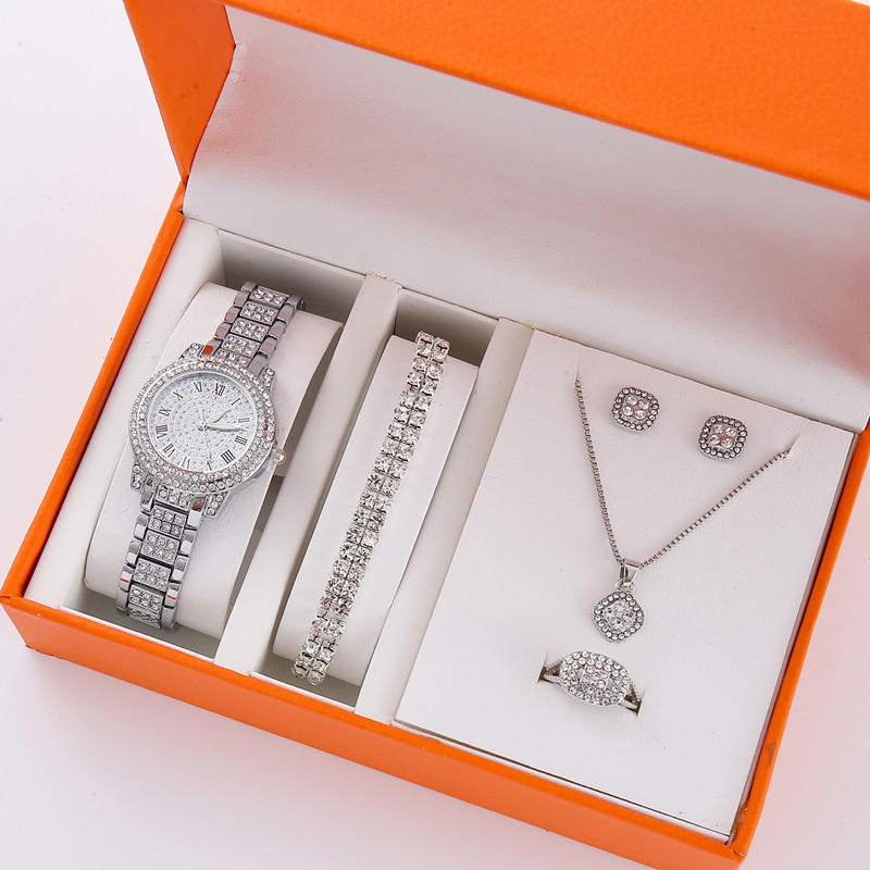 Nuevo producto para mujer 5pcs/set moda de nicho todo fósforo falso traje de reloj de cuarzo con cinturón de acero de tres ojos