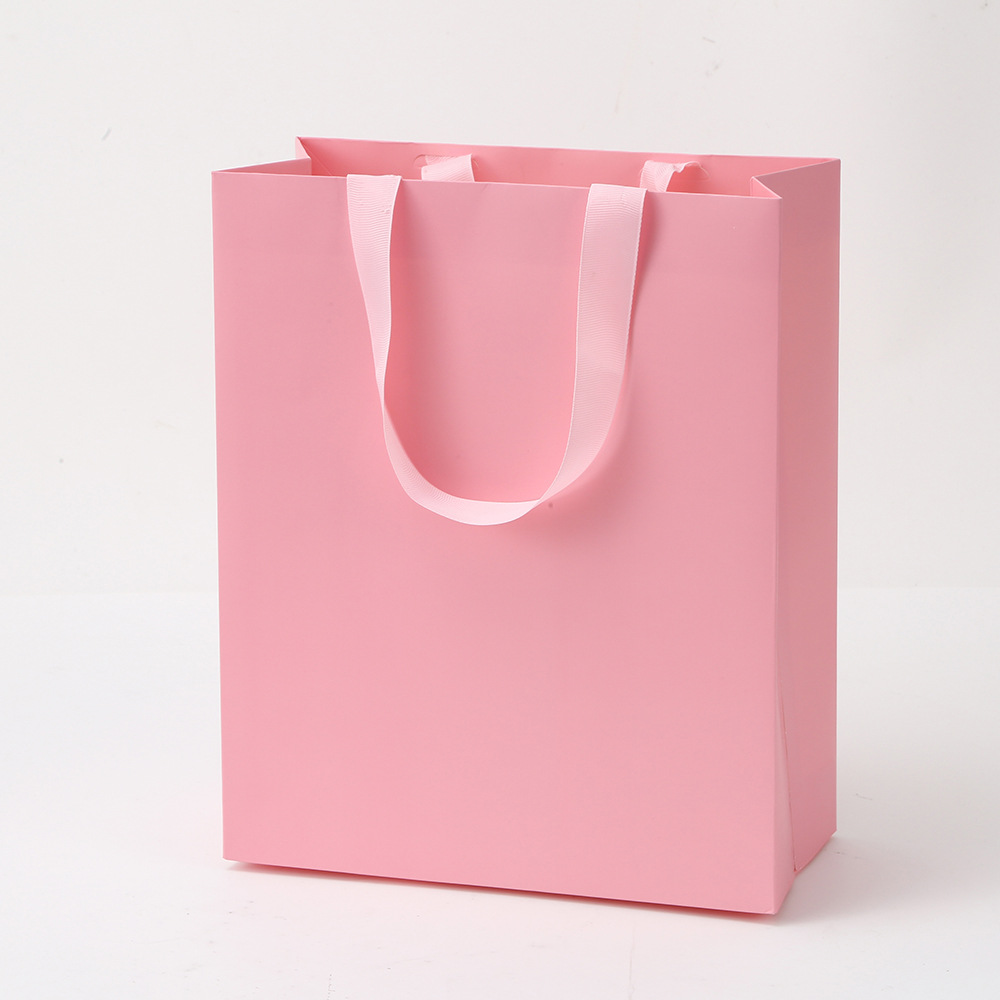 Bolsas de papel de mano de stock joyería ropa bolsa de papel de cartón blanco logotipo impresa bolsa de embalaje vertical bolsa sin cintura