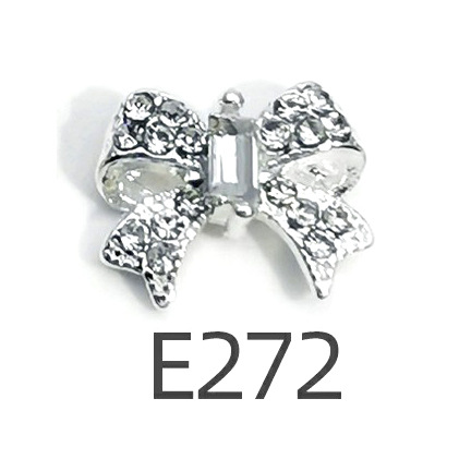 Transfronterizo Japonés arco de uñas accesorios de pajarita caliente simple todo fósforo tridimensional hueco joyería de uñas de diamantes al por mayor