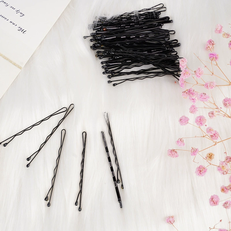 Black hairgrip, hair accessory