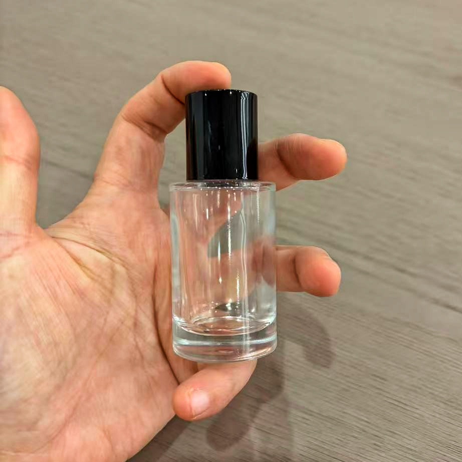 Bayoneta cilíndrica de 30ML; cubierta de plástico negro; vidrio