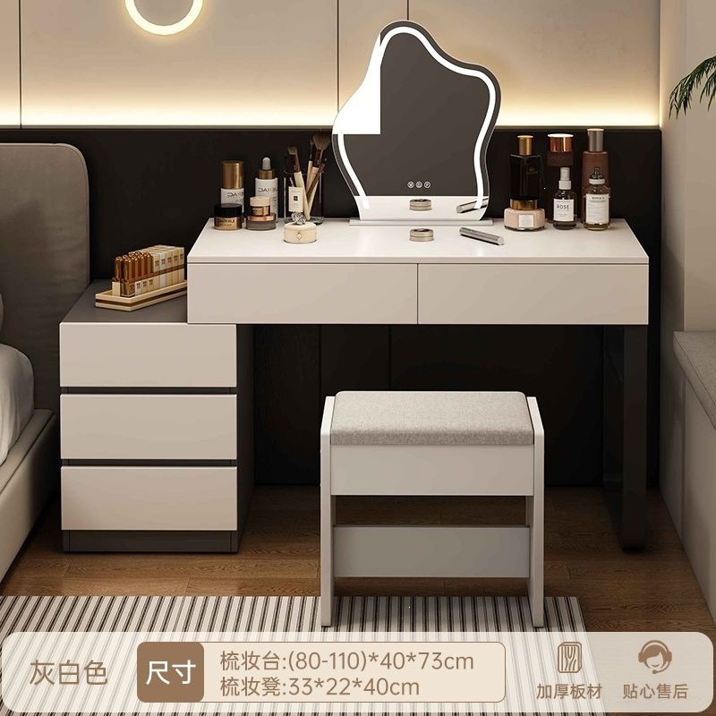 Wardrobe de madera maciza de tabla de roca dormitorio moderno simple pequeño tipo de lujo ligero de alta sensación armario de maquillaje en casa