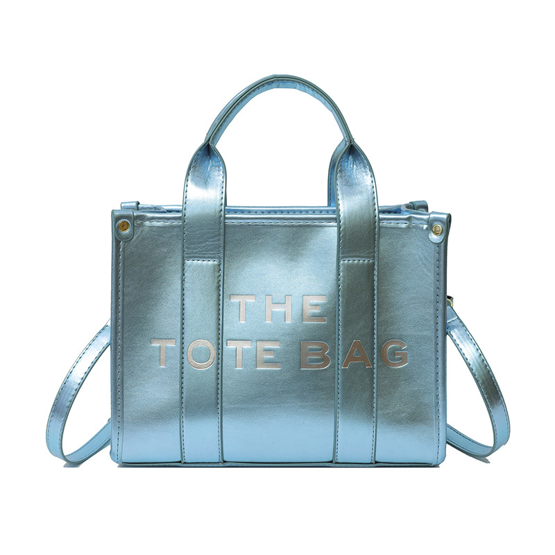 Perla brillante superficie portátil bolsa de mano para las mujeres 2023 nuevo sudeste asiático moda nicho textura hombro mensajero bolsa