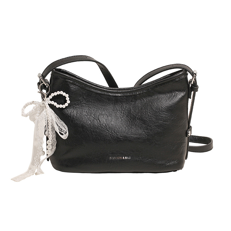 Bolso de axila para mujer 2025 nuevo estilo de alta gama, bolso de hombro de nicho, bolso de mensajero de todo fósforo de cercanías, bolso de cubo popular de este año