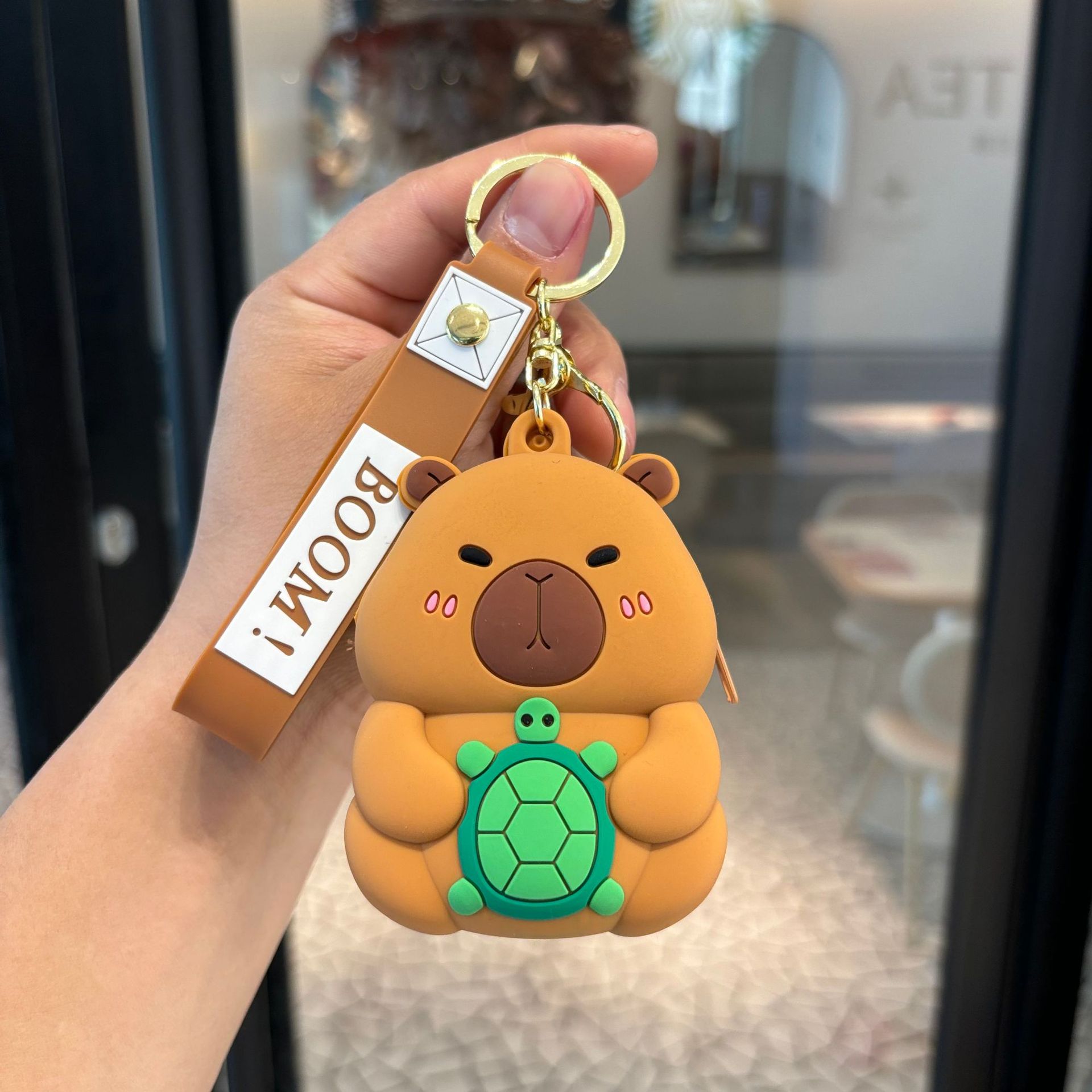 Transfronterizo Kapibara llaveros Kulomi bolsos de cambio llaves colgantes bolsos accesorios pequeños regalos al por mayor