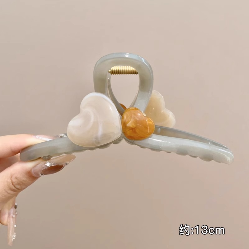 Temperamento de alto nivel amor agarrar clip de cabello de niñas más clip de tiburón detrás de la cabeza de un disco grande clip de cabello tocado