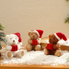 国境を越えた新製品のクリスマスペンダントはかわいいベアーの赤いクリスマス帽ベアーがギフトバッグを抱いてクリスマス装飾品を飾っている