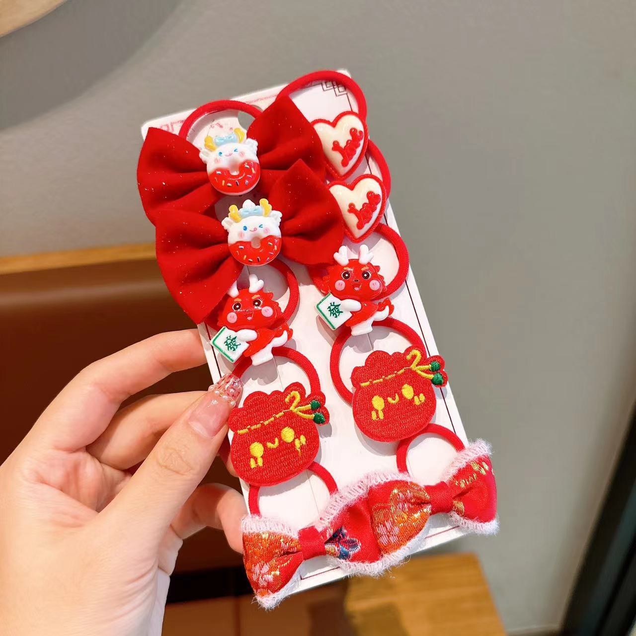 Las chicas de la banda de goma del Año Nuevo de los niños no lastiman el pelo de alta banda de goma elástica bebé rojo festivo Año Nuevo cuerda de pelo tocado