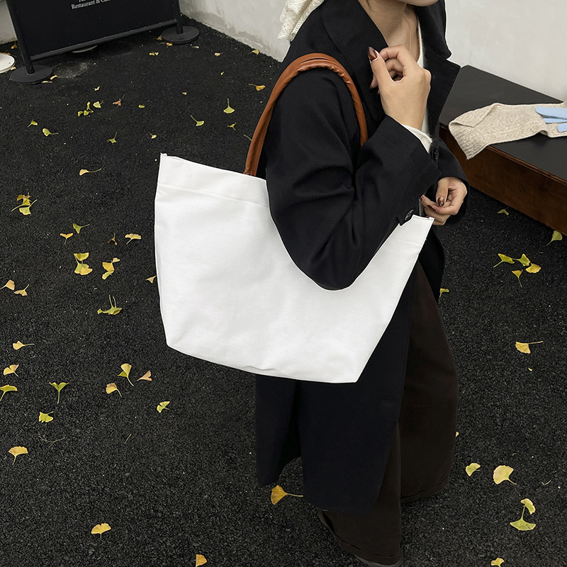 帆布包女2025新款韩版ins学生大容量手提包单肩购物袋简约托特包