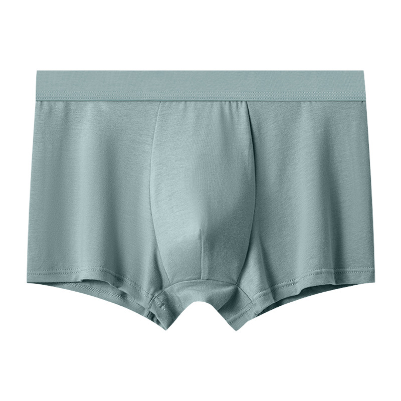 Pantalones interiores de hombre de cintura media de color sólido antibacteriano respirable piel cómoda pantalones planos fabricantes de hombres al por mayor