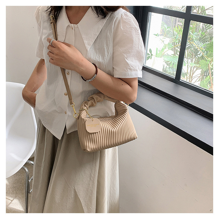 Strukturierte Handtasche mit vertikalen Streifen 2024, neues Nischendesign, Umhängetasche mit einer Schulter, vielseitige Tasche im ausländischen Stil, Großhandel für Damen_voghion.com