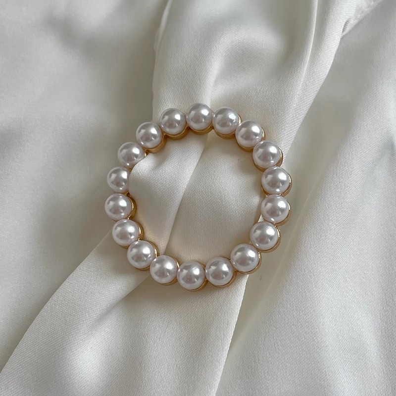 Hebilla anudada en las esquinas de la ropa mujer 2025 nuevo hebilla de toalla de seda botón de perlas de alta gama hebilla de hebilla de ropa de alta gama