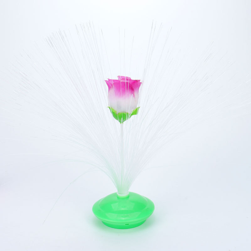 ファッションロマンチックな光ファイバーの花が輝いています。|undefined