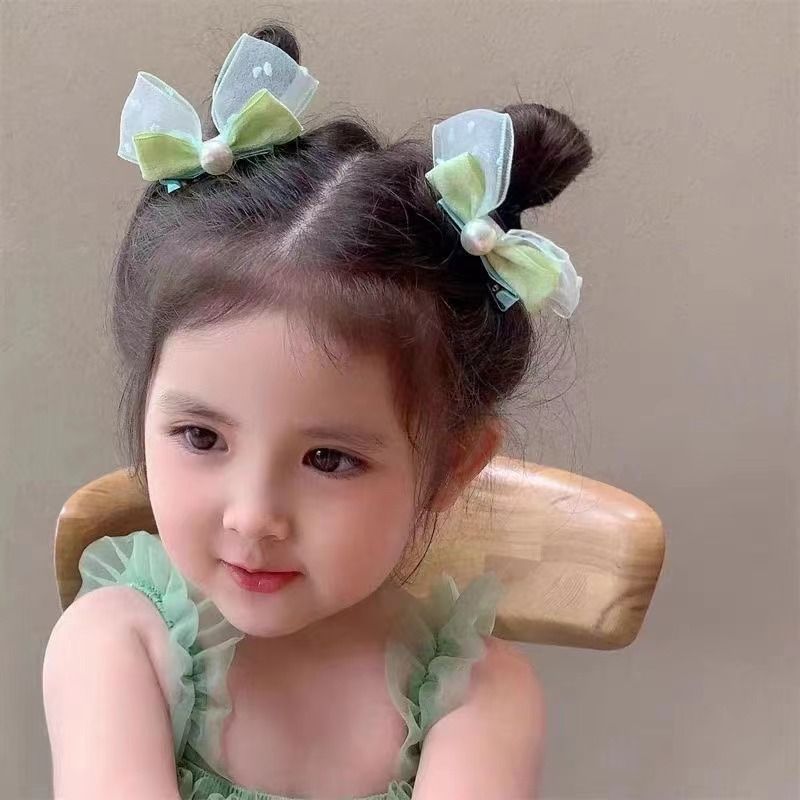 韓国の小さい清新な子供のヘアピンの網の糸の蝶結びの真珠のヘアピンの側はかわいい赤ちゃんを挟んで髪の飾りを傷つけません。|undefined