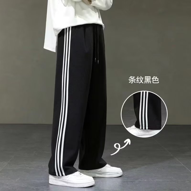 Primavera y otoño tres barras pantalones casuales deportes de los hombres pantalones de chándal recortados de moda marca niños verano Pantalones largos rectos