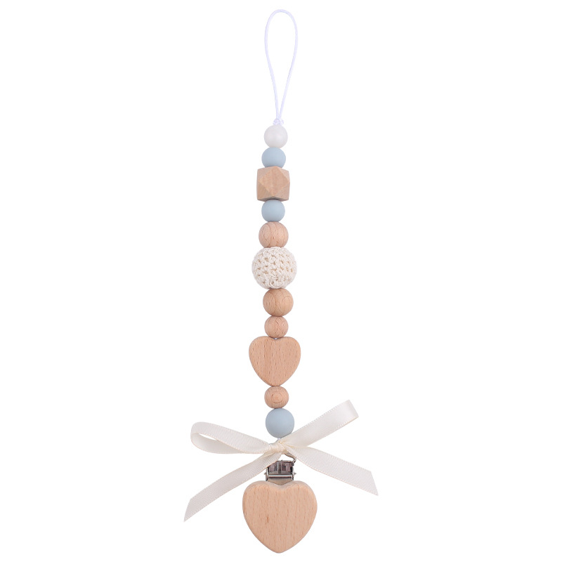 Nuevo bebé de dibujos animados hechos a mano arco chupete cadena creativa DIY bebé silicona teether pulsera juguete