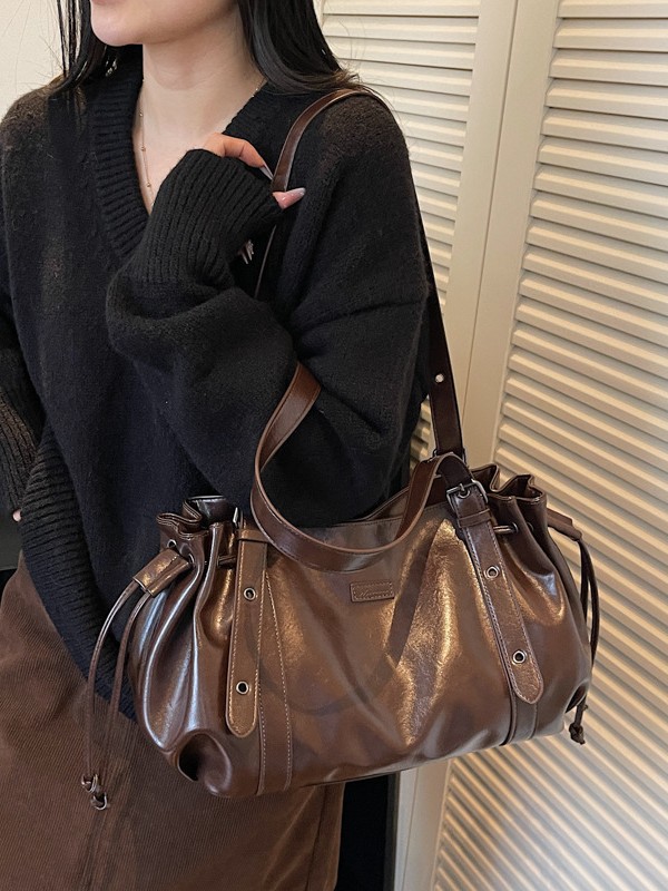 Bolso de gran capacidad para mujeres 2025, nuevo cross-border retro mochila de hombro de textura superior, bolsa de transporte de ocio