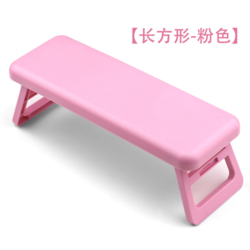Transfronterizos manicuría almohada plegable y alta luz manicuría almohada de mano de plástico manicuría tienda de manicuras muñeca soporte almohada al por mayor