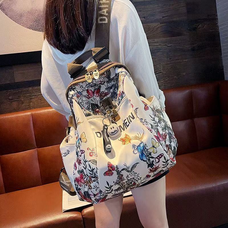 Perezoso viento alto valor de la cara explosivo estilo de moda extranjero anti-sucio damas mochila de viento 2025 mochila de viaje