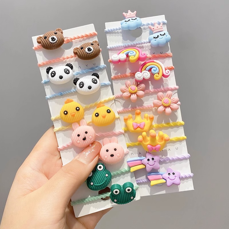 La cuerda del pelo del bebé de las muchachas de la banda de goma de los niños no lastima el pelo Los accesorios del pelo del pulgar del tamaño pequeño atan la banda de goma del pelo