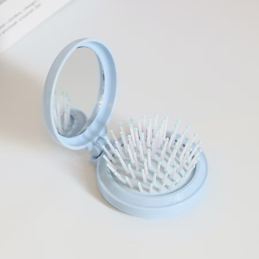 Airbag plegable Pequeño peine con espejo de maquillaje DIY adorable cojín de aire de niña cabeza de masaje portátil peine espejo todo en uno