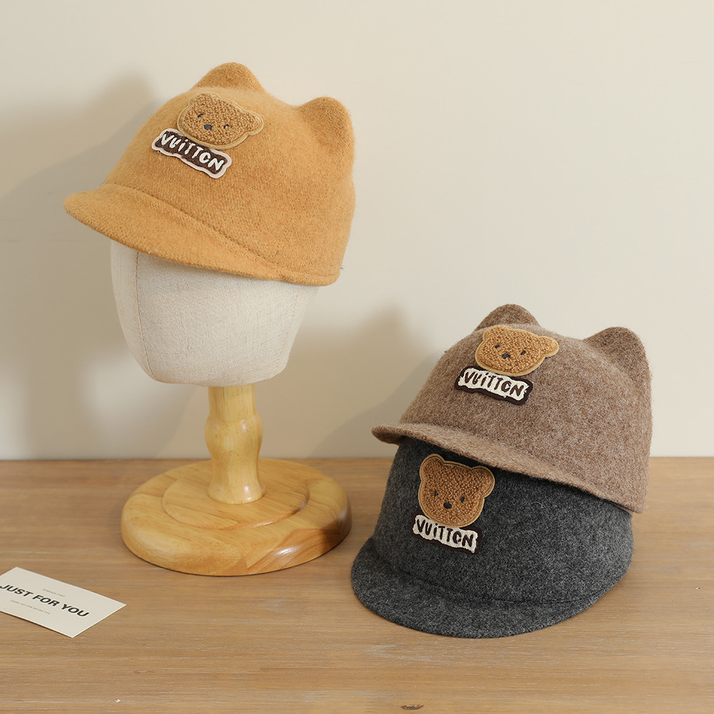 La nueva gorra de orejas de oso lindo y súper lindo niño coreano bebé masculino y femenino otoño e invierno cálido sombrero de copa de lana