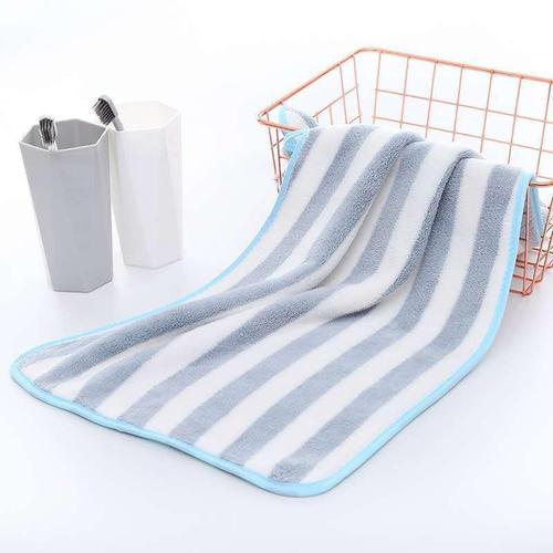 Manufacturer wholesale warp knitted colorful striped coral velvet towel soft absorbent face towel cationic striped floor stall towel