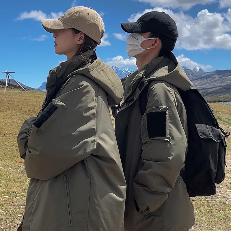 Nuevo abrigo de algodón de pluma para mujeres 2024 invierno engrosado intercalado de algodón de asalto ropa coreana impermeable pareja abrigo de moda