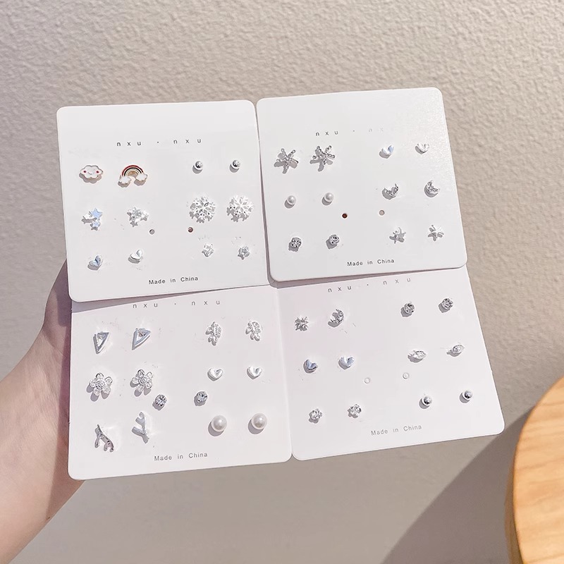 Juego de pendientes para mujeres en 2025 nuevo estilo de moda, pendientes de perlas delicados temperamento coreano de diseño en línea sensación de pendientes