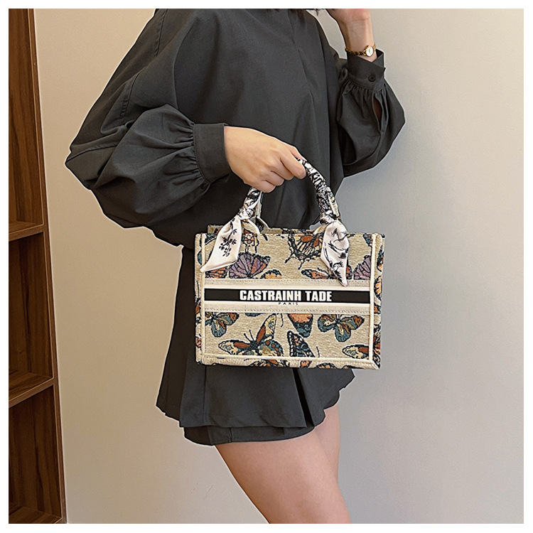 Comercio exterior transfronterizo al por mayor bolso de mano para mujeres 2024 nueva moda impresión popular tamaño de mariposa bolso de hombro