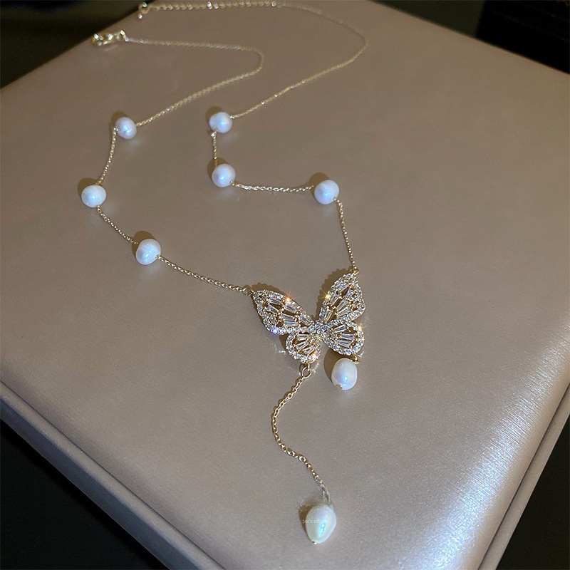 Necklace with butterfly from pearl