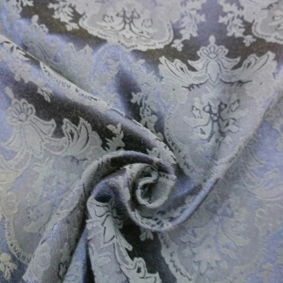 厂家直销 大饼花涤棉提花 梭织纬弹 女装大提花双色不加捻面料