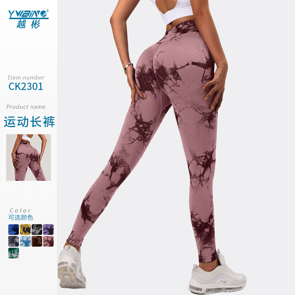 Nuevo europeo y americano sin costuras de cintura alta deportes Levantamiento de cadera de secado rápido pantalones de fitness apretados de las mujeres corriendo melocotón pantalones de yoga teñidos con lazo