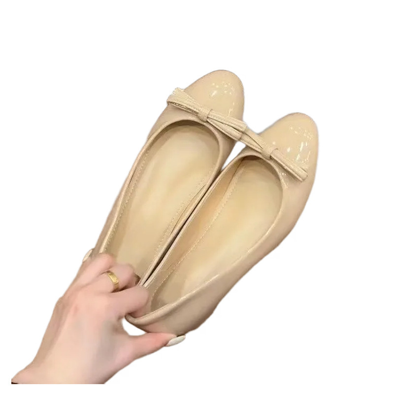 Hermoso arco rosa desnudo un pedazo de zapatos de una sola mujer 2026 primavera y verano nuevos zapatos de ballet de viaje retro