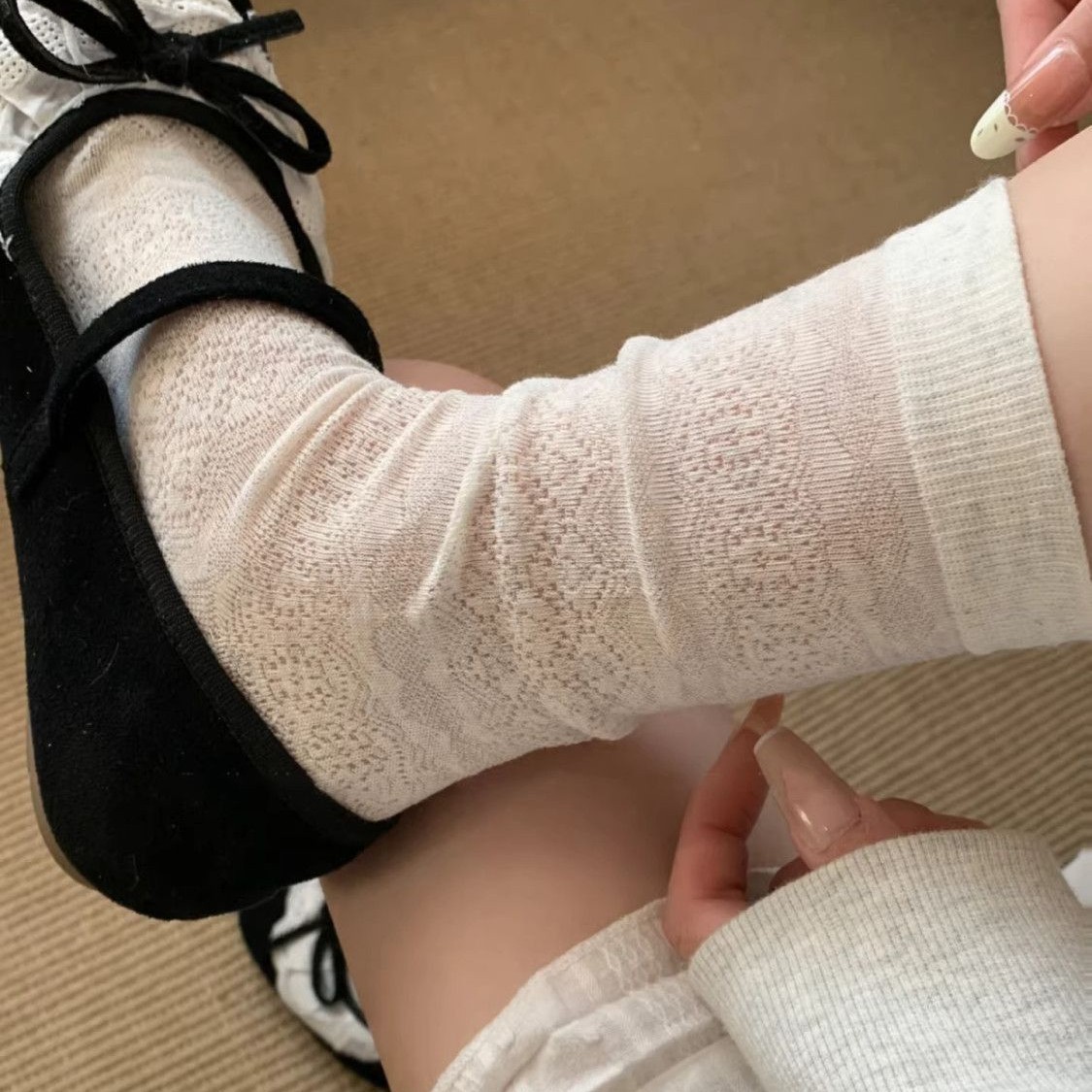 The light gray and dark pattern hollow socks look so good!Full of…