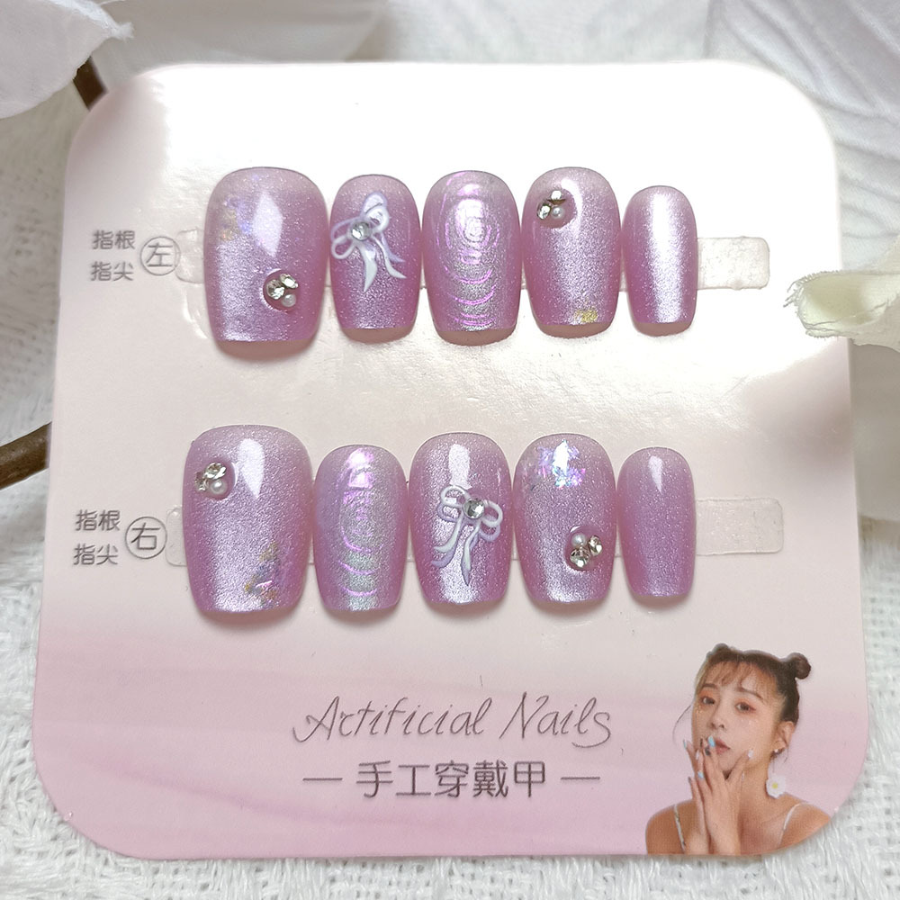 Libro rojo de venta caliente de uñas de ojo de gato portátiles, parches de uñas de fototerapia simples, 10 piezas de uñas hechas a mano.