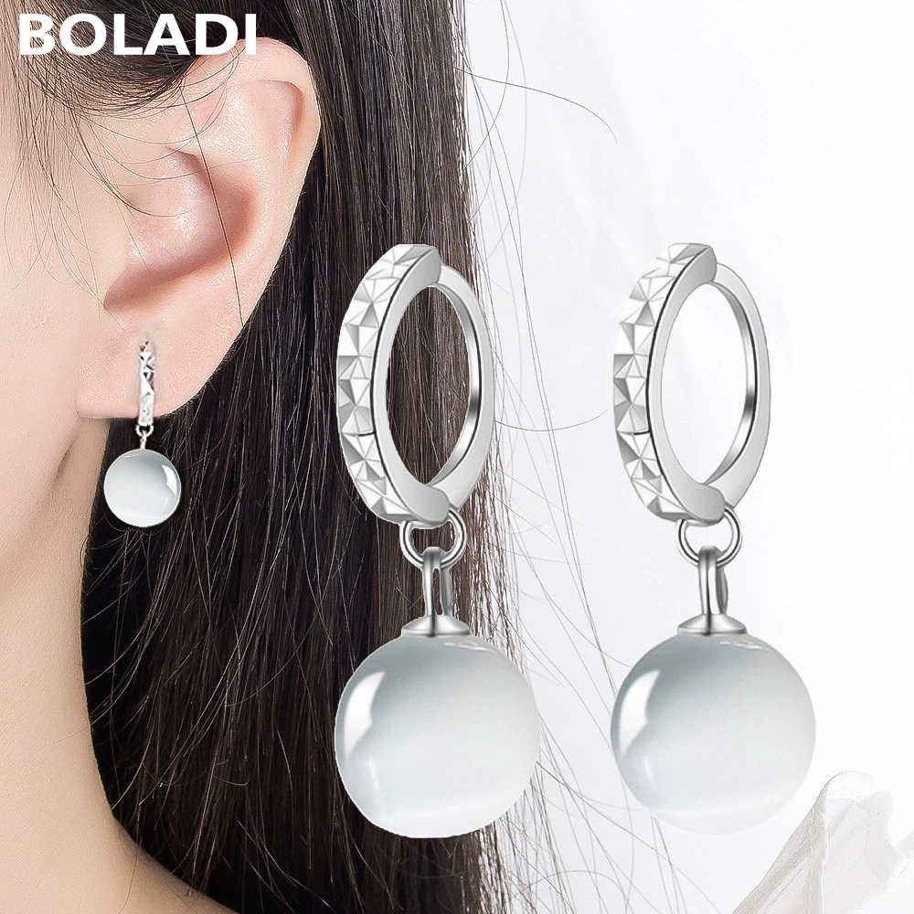 Cute universal fashionable earrings with tassels, 925 sample silver, cat's eye, Korean style