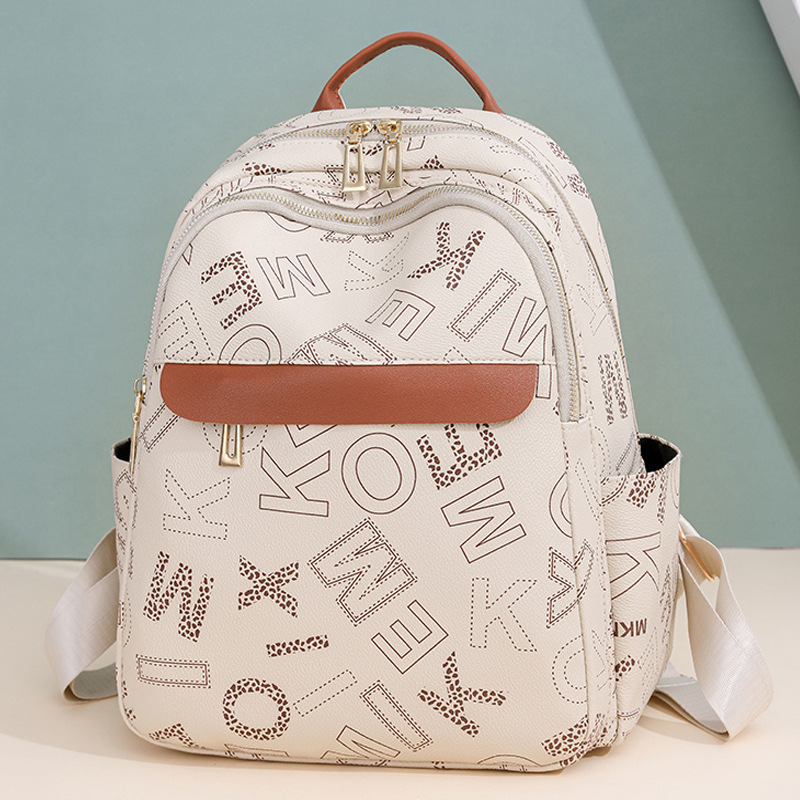 Mochila retro mujer 2024 nuevo estilo de moda casual impresión de letras mochila de gran capacidad mochila de viaje simple al por mayor