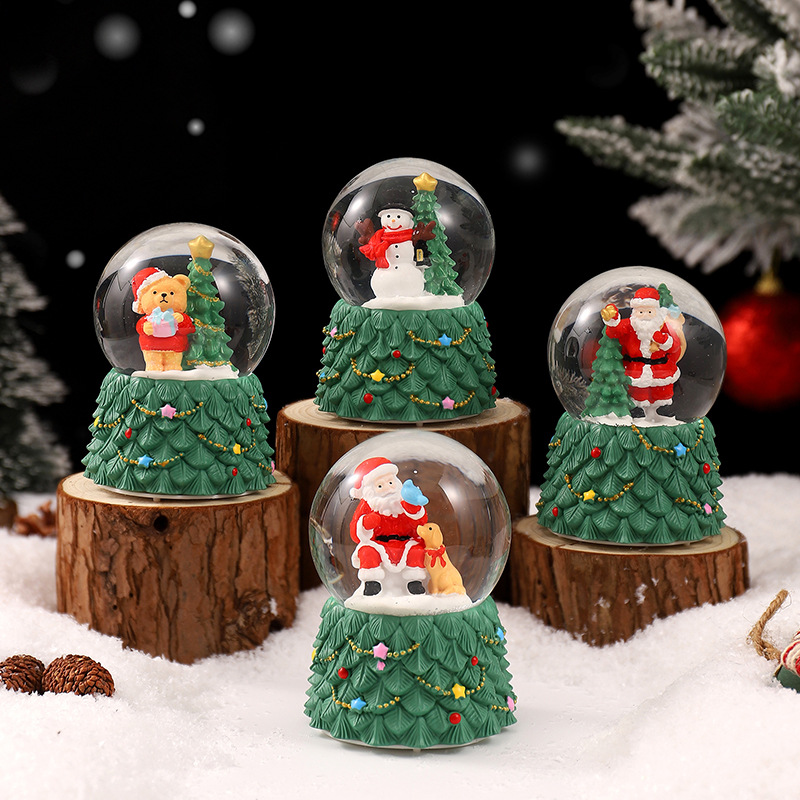 Una variedad de regalos de decoración de Navidad Navidad iluminante bola de cristal caja de música ventana diseño de velas lámparas de viento árbol de Navidad