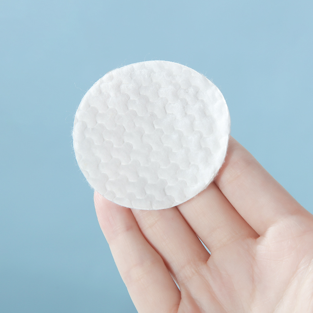 Algodón redondo a granel de suministro directo, algodón cosmético personalizado en relieve, algodón desechable, algodón desmaquillaje, algodón des uñas