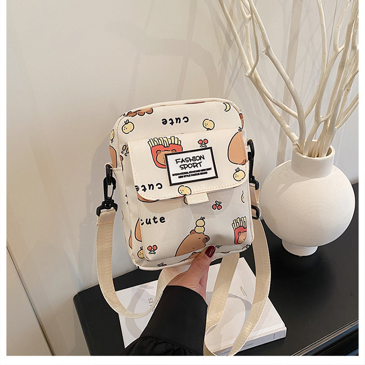 Cartoon animal print, many pockets, few bags, single-shoulder bag for girls, large capacity, cute graffiti, lightweight schoolbag for primary and middle school students undefined
